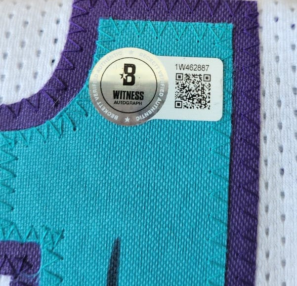 Muggsy Bogues Playera Charlotte Autografiada certificada por Beckett con holograma 1W462887