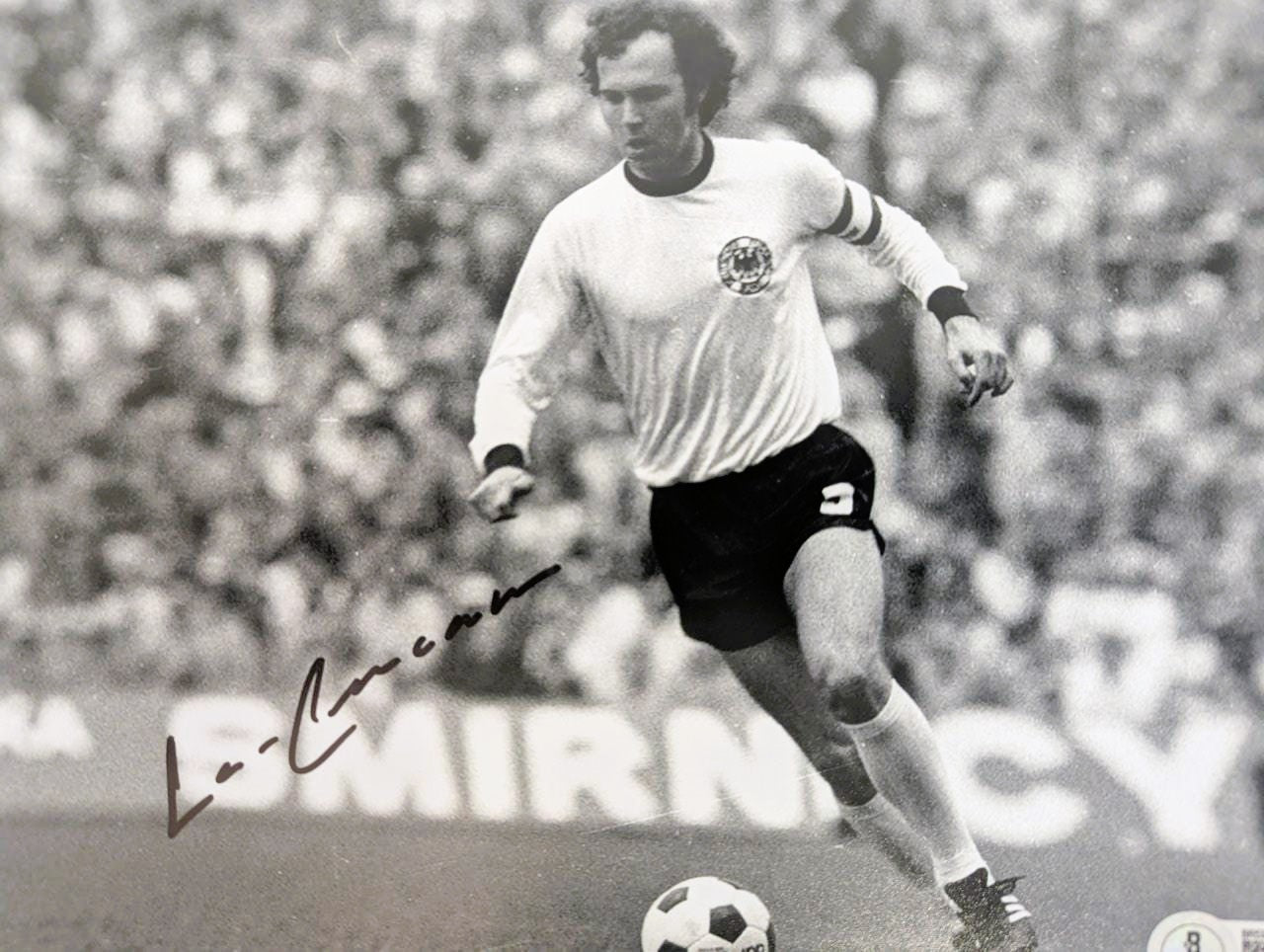 Franz Beckenbauer Fotografía autografiada, firma certificada por la compañía Beckett con el número BR53463.