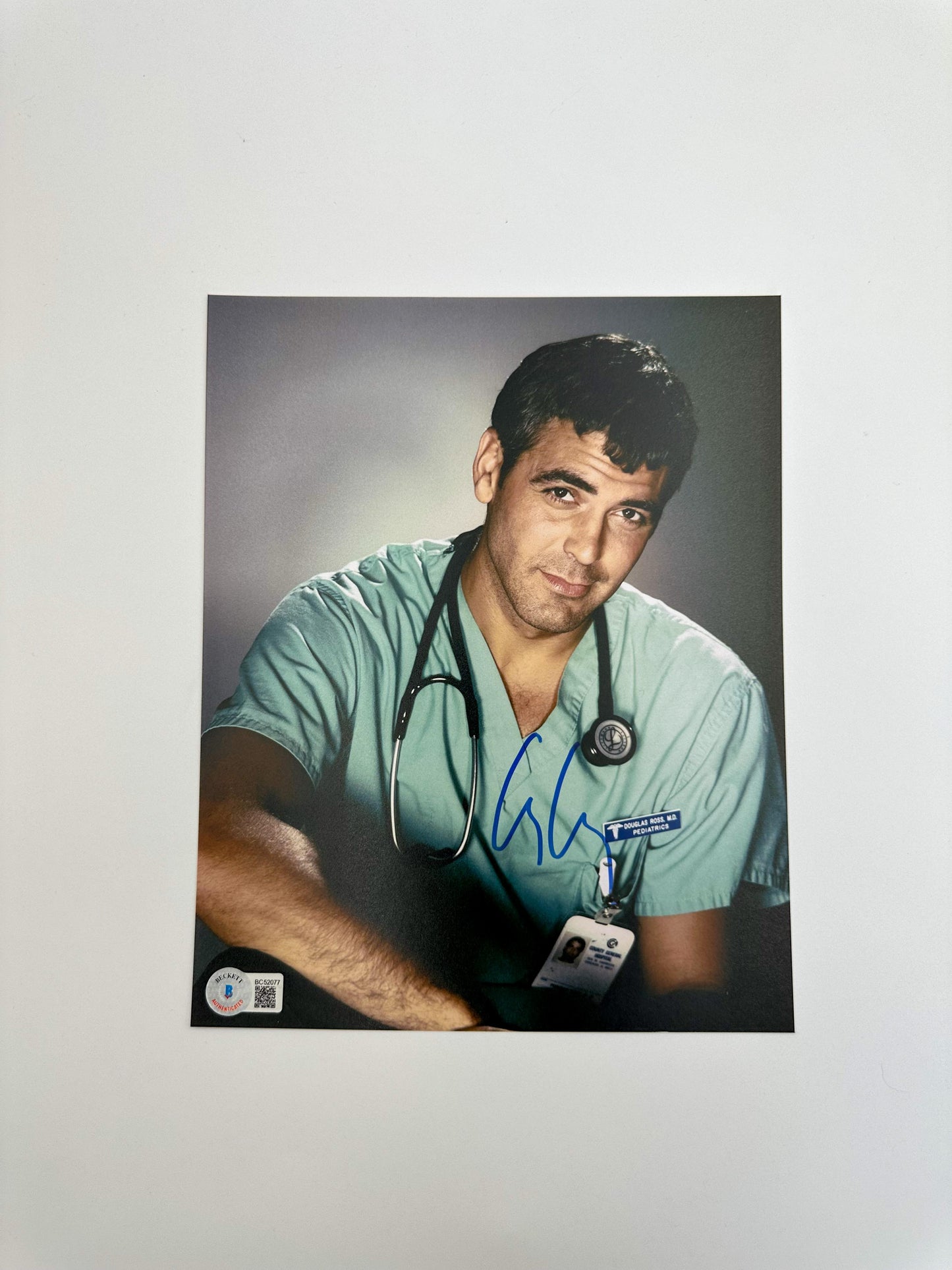 George Clooney Fotografía Autografiada firma certificada por Beckett BC52077.