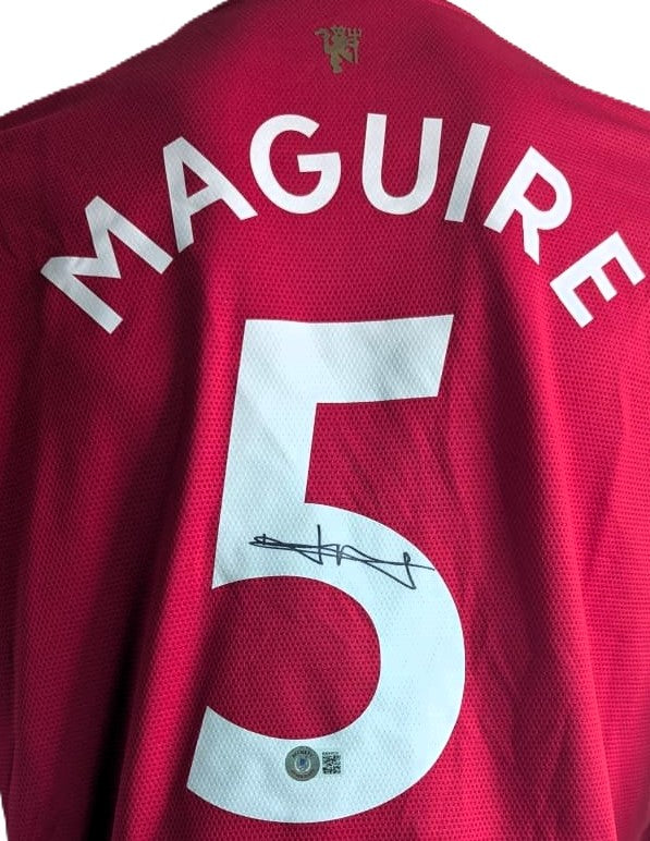 Harry Maguire Playera Manchester United autografiada firma autentificada por la compañía Beckett con el número BB94779.