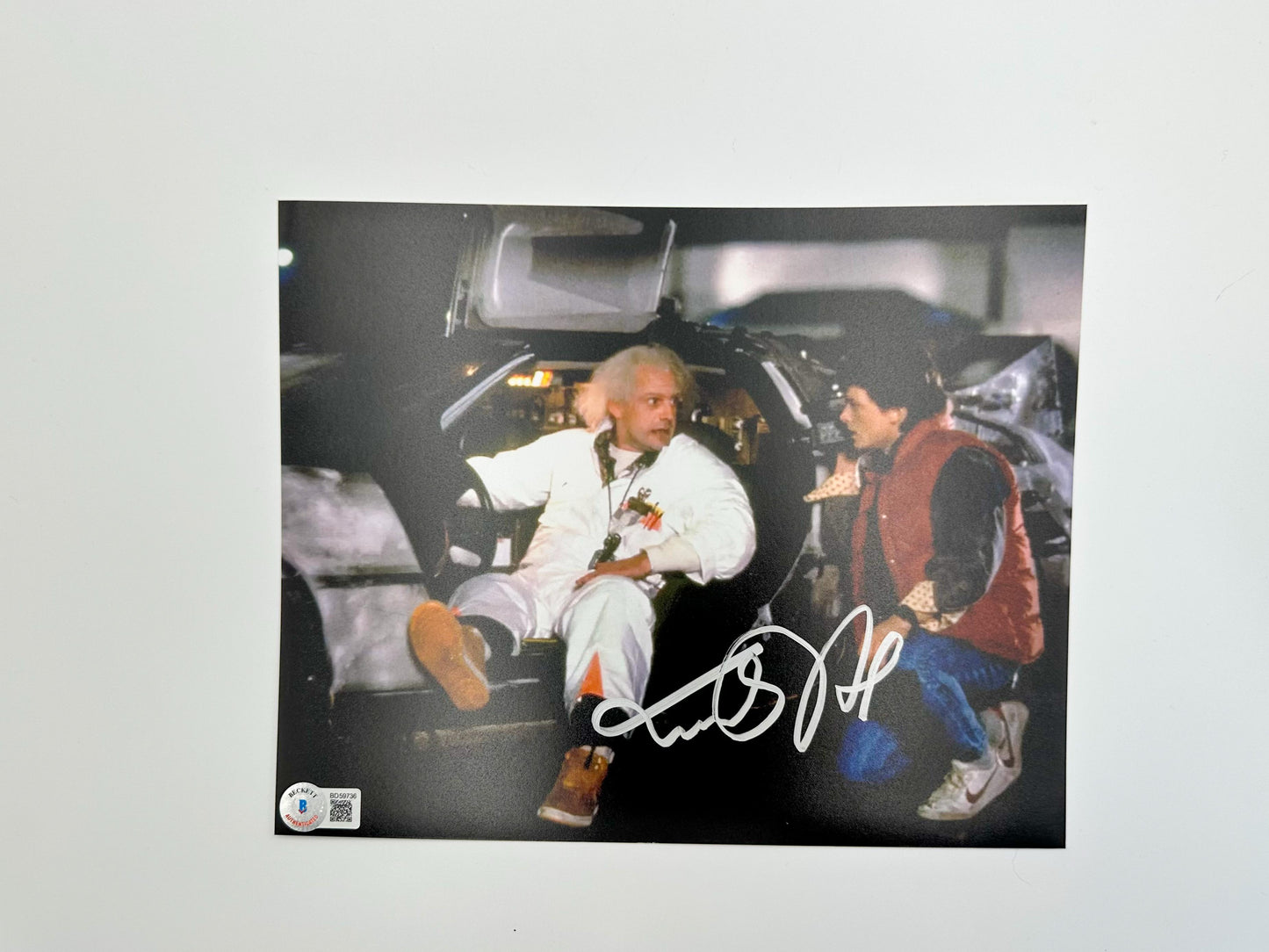 Michael J. Fox Fotografía autografiada “Volver al Futuro ”, firma certificada por la compañía Beckett con el número BD59736