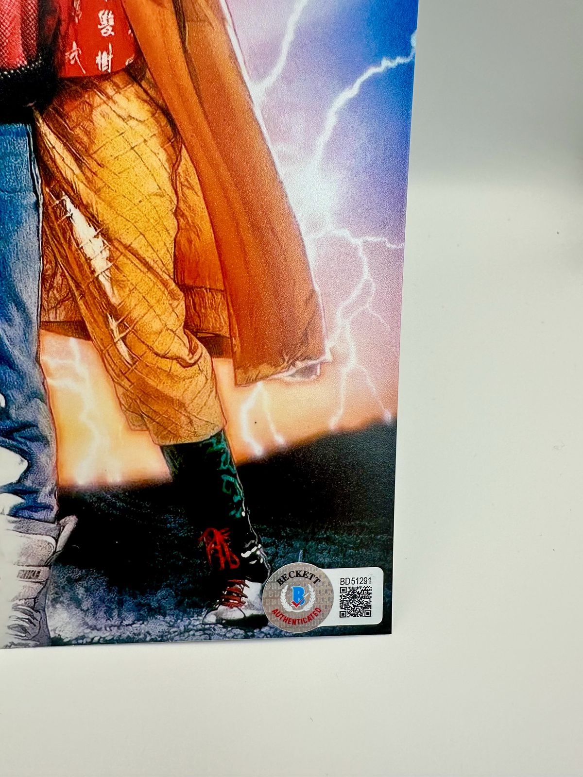 Michael J. Fox Fotografía autografiada “Volver al Futuro”, firma certificada por la compañía Beckett con el número BD51291