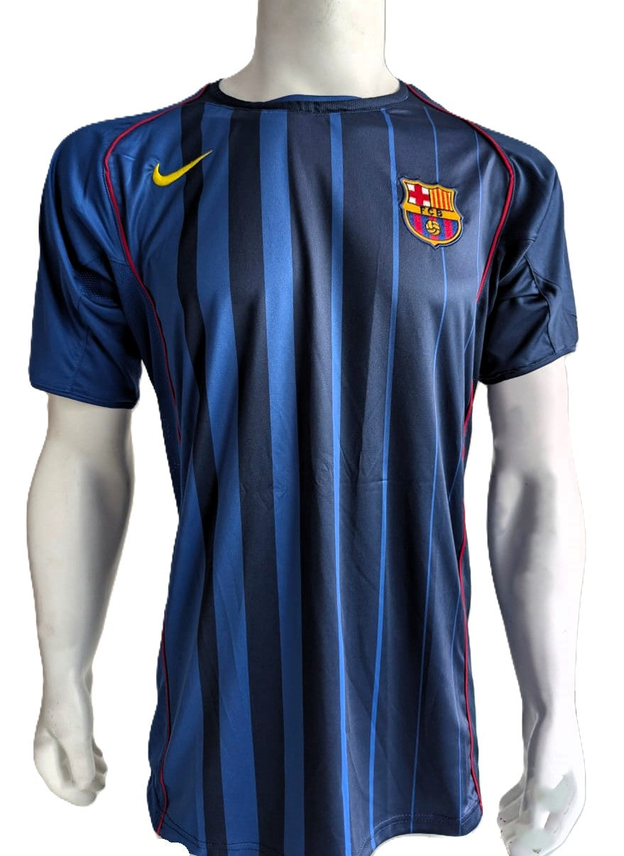 Xavi Hernández Playera Barcelona autografiada, firma certificada por la compañía Beckett con el número BN23770.