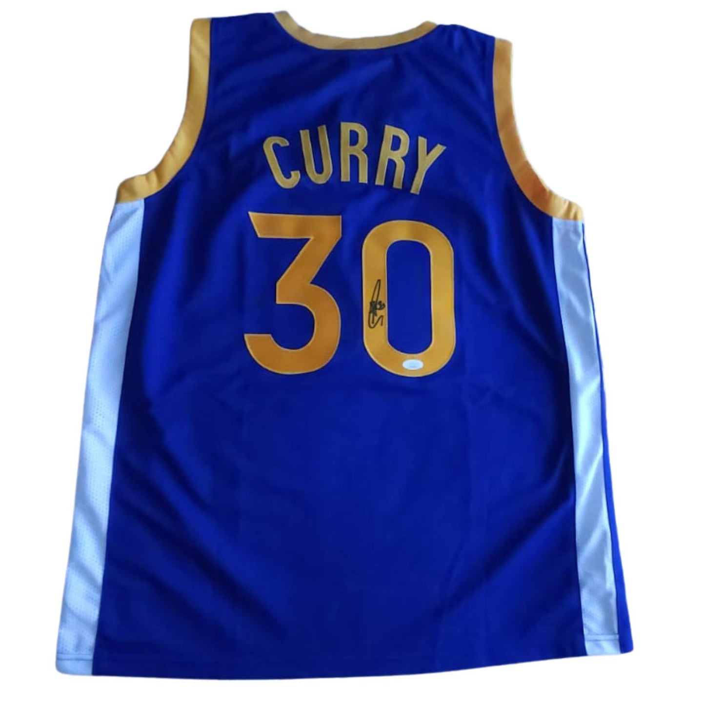 Playera autografiada por Stephen Curry firma autentificada por la compañía JSA con el número AL17312.