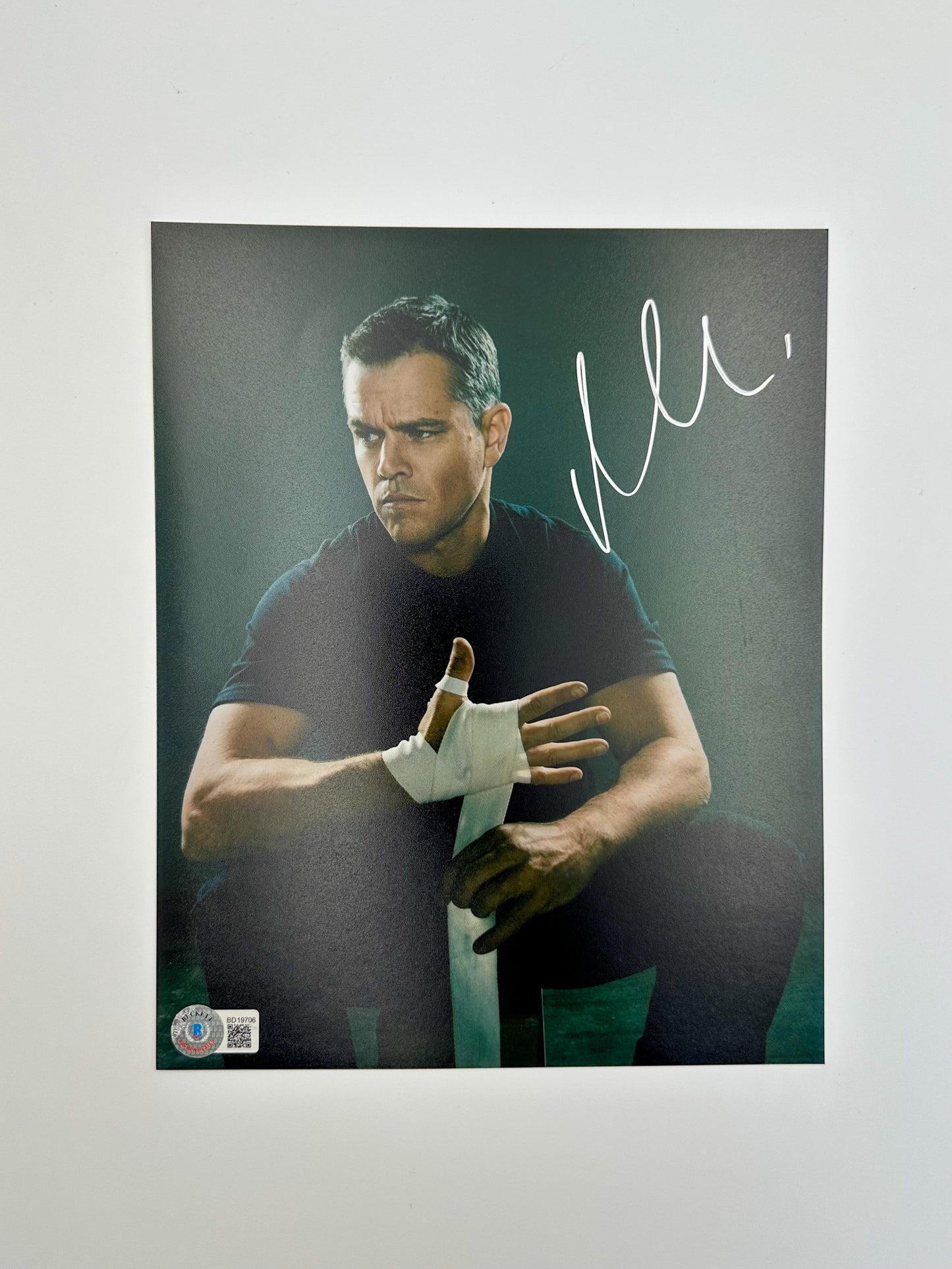 Matt Damon Fotografía autografiada “Jason Bourne”, firma certificada por la compañía Beckett con el número BD19706