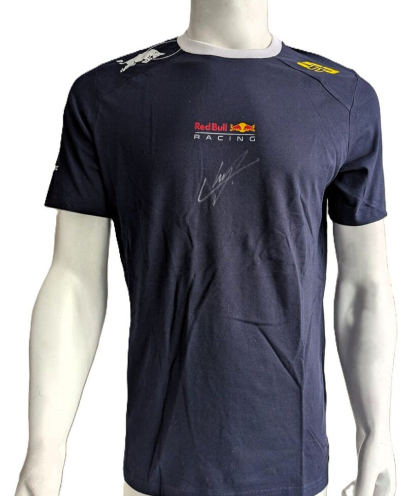 Sergio "Checo" Pérez Playera autografiada firma autentificada por la compañía Beckett con el número BH060230.