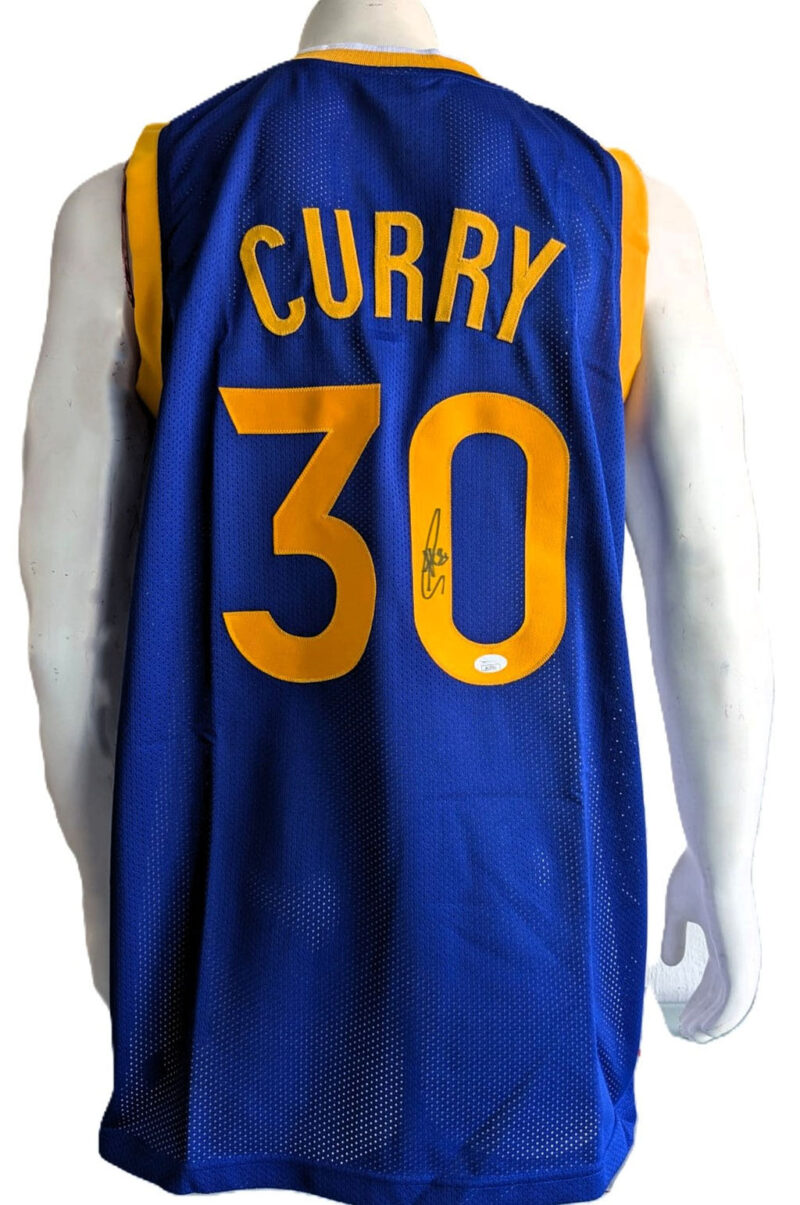 Stephen Curry Playera Golden State autografiada firma autentificada por la compañía JSA con el número AL17312.
