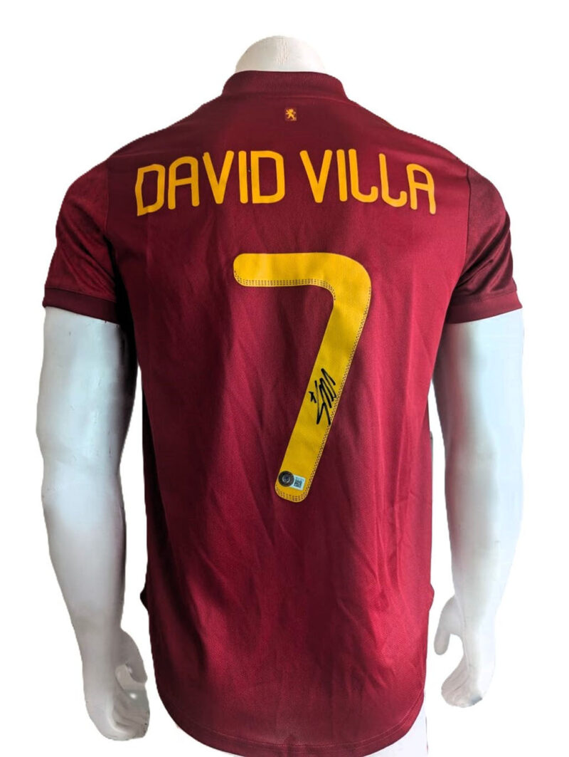David Villa Playera España autografiada firma autentificada por la compañía Beckett con el número BE27913.