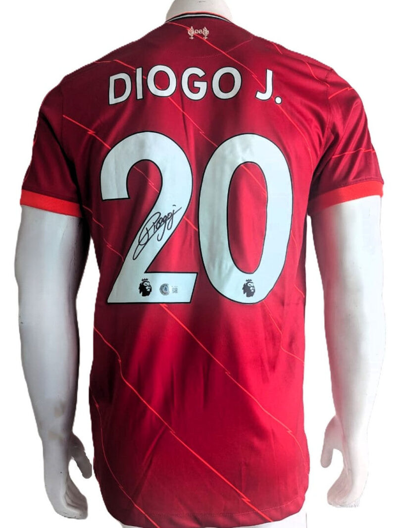 Diogo Jota Playera Liverpool FC autografiada firma autentificada por la compañía Beckett con el número BC49953.