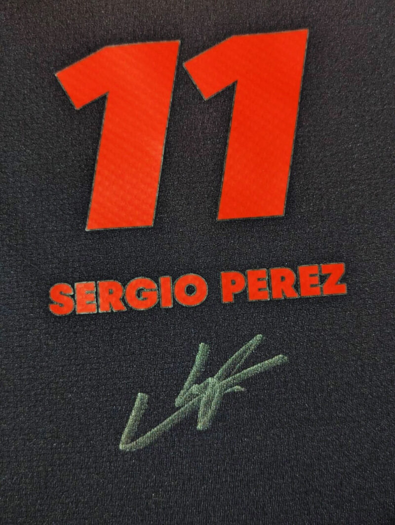 Sergio "Checo" Pérez Jersey autografiado firma autentificada por la compañía Beckett con el número W622240