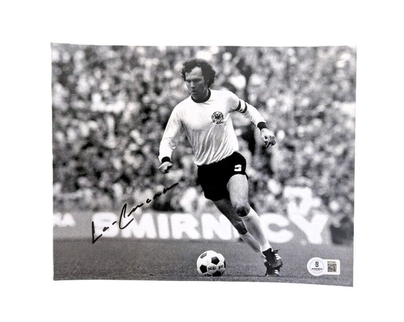 Franz Beckenbauer Fotografía autografiada, firma certificada por la compañía Beckett con el número BR53463.