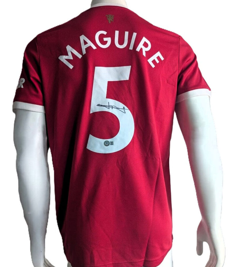 Harry Maguire Playera Manchester United autografiada firma autentificada por la compañía Beckett con el número BB94779.