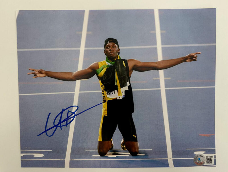 Usain Bolt Fotografía autografiada, firma certificada por la compañía Beckett con el número BB14301.