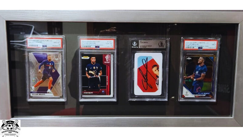 Kylian Mbappé tarjetas enmarcadas, una de ellas autografiada, firma autentificada por la compañía Beckett con el número 15600089.