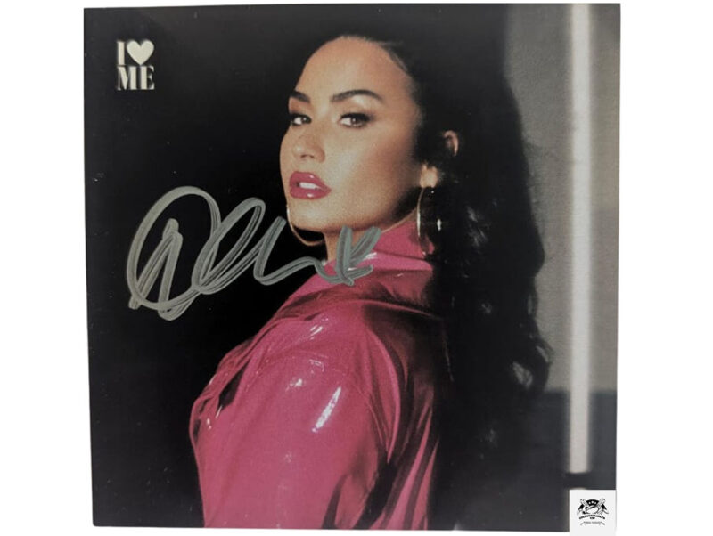 Demi Lovato autógrafo en portada de disco I ♥  Me certificado JSA AW19041