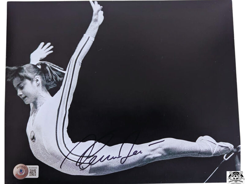 Nadia Comaneci fotografía autografiada certificada por Beckett BG98569